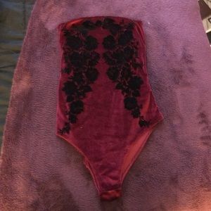 red and black velvet body suit